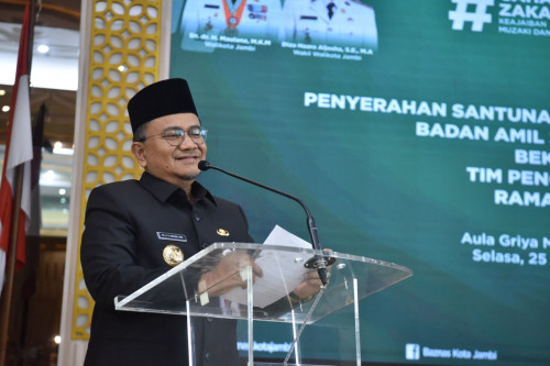cover Jelang Lebaran, Baznas dan TP PKK Kota Jambi Berbagi Kebahagiaan Bersama Anak Yatim dan Kaum Dhuafa